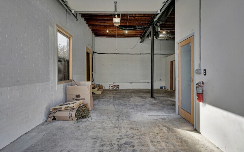 Small industrial with apartment above for sale